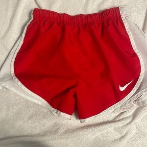 Red Nike shorts